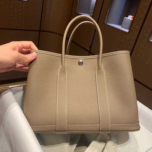 original edition designer hremm party garden bags online store high grade genuine leather garden bag for women 2023 new highcapacity tote co
original edition designer hremm party garden bags online store high grade genuine leather garden bag for women 2023 new highcapacity tote co