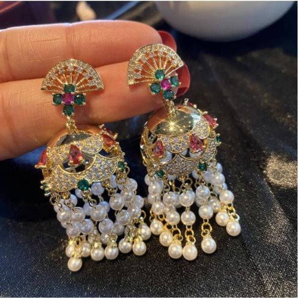 knot s925 silver needle micro inlaid zircon wind chime tassel earrings retro pearl color earrings female
knot s925 silver needle micro inlaid zircon wind chime tassel earrings retro pearl color earrings female