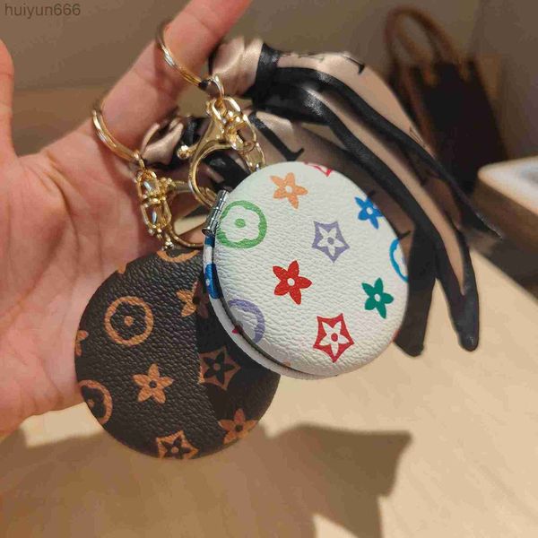 fashion designer flowers cosmetic mirror keychains for women exquisite old flower leather pendant double sided mirror bag key chain pendant, Silver
fashion designer flowers cosmetic mirror keychains for women exquisite old flower leather pendant double sided mirror bag key chain pendant, Silver
