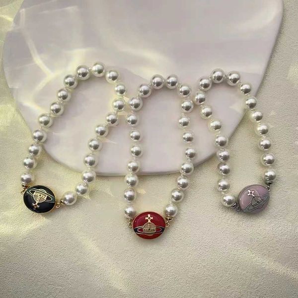 western empress dowager vivian vivienne color paint magnetic suction enamel buckle pearl bracelet, Golden;silver
western empress dowager vivian vivienne color paint magnetic suction enamel buckle pearl bracelet, Golden;silver