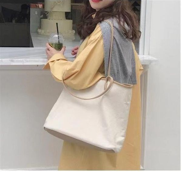 fashionable women's pu leather bag, large canvas handbag, shopping bag with small bag, brown garbage bag, internet red, the same essent
fashionable women's pu leather bag, large canvas handbag, shopping bag with small bag, brown garbage bag, internet red, the same essent