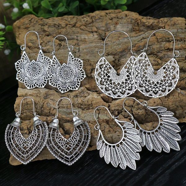 bohemian carved palace style earrings indian jewelry ethnic women's jhumka dangle earrings retro metal hollowed out flower earrings, Silver
bohemian carved palace style earrings indian jewelry ethnic women's jhumka dangle earrings retro metal hollowed out flower earrings, Silver