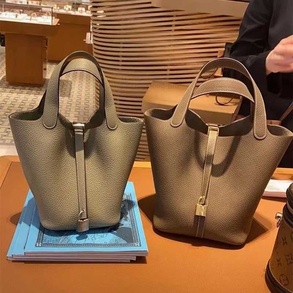 designer handbag picotin lock cargo her bags 2023 head layer cowhide soft leather vegetable basket women's bag small bucket large capac
designer handbag picotin lock cargo her bags 2023 head layer cowhide soft leather vegetable basket women's bag small bucket large capac
