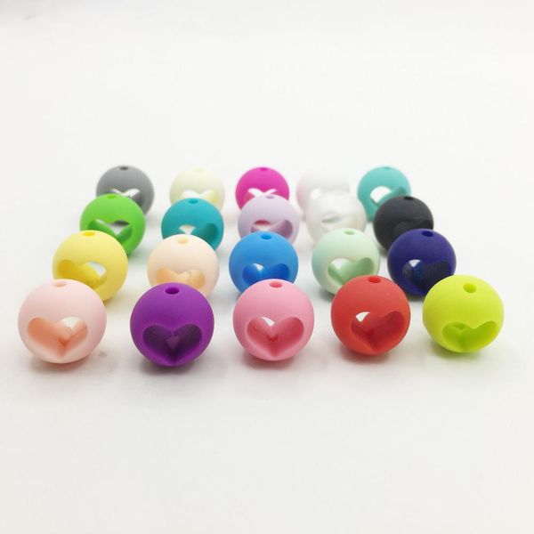 crystal 100pieces/lot silicone beads baby teething beads 15mm round bead with heart shaped design teething 15mm round silicone beads
crystal 100pieces/lot silicone beads baby teething beads 15mm round bead with heart shaped design teething 15mm round silicone beads