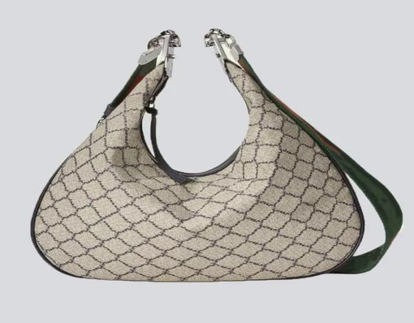 attache large shoulder bag beige blue canvas crescent moon g shaped hook closure ebony blue red web trim additional leather strap 5557629
attache large shoulder bag beige blue canvas crescent moon g shaped hook closure ebony blue red web trim additional leather strap 5557629
