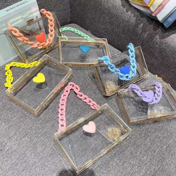 transparent multicolor acrylic small square bag fashion versatile macaron resin handheld chain women's bag 230522
transparent multicolor acrylic small square bag fashion versatile macaron resin handheld chain women's bag 230522