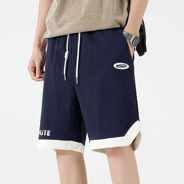 men's loose work clothes sports shorts beach and ice thin quick drying, White;black
men's loose work clothes sports shorts beach and ice thin quick drying, White;black