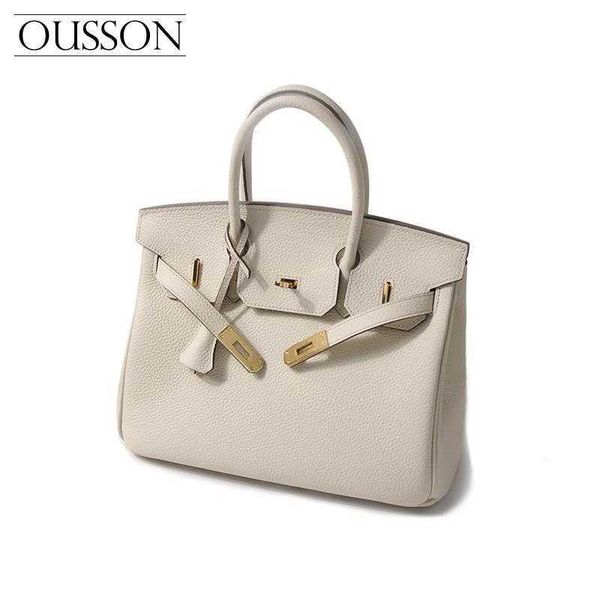 birkin this year's popular color milkshake white new layer cow leather bag leather women's handbag
birkin this year's popular color milkshake white new layer cow leather bag leather women's handbag
