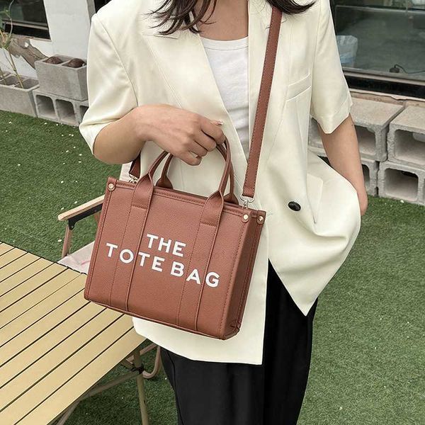 the tote marc this year's popular new women's bag small group carrying korean version large capacity one shoulder tote jacobs93c5j
the tote marc this year's popular new women's bag small group carrying korean version large capacity one shoulder tote jacobs93c5j