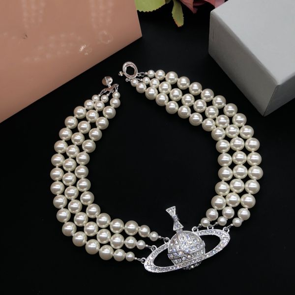 fashion designer vivian pendant necklaces women pearl saturn chokers planet necklace cjeweler woman westwoods jewelry 346457, Silver
fashion designer vivian pendant necklaces women pearl saturn chokers planet necklace cjeweler woman westwoods jewelry 346457, Silver