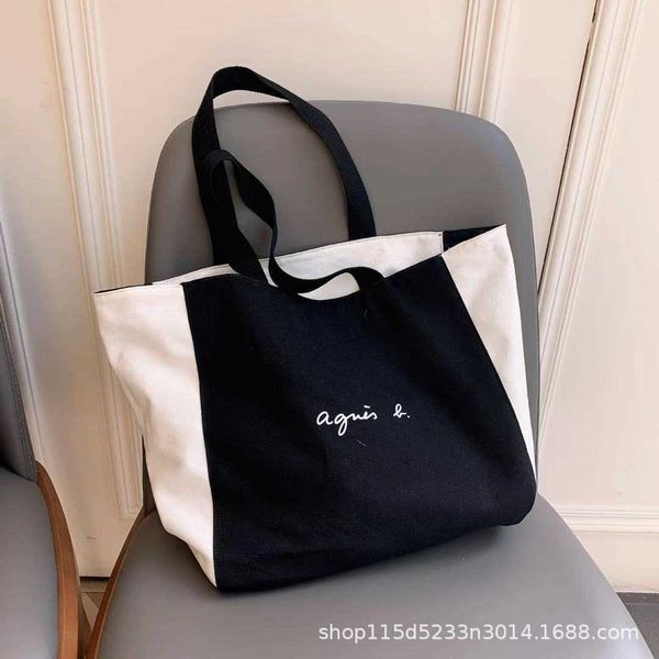 japanese single ab new black and white two sided simple large capacity portable canvas shopping tote bag
japanese single ab new black and white two sided simple large capacity portable canvas shopping tote bag
