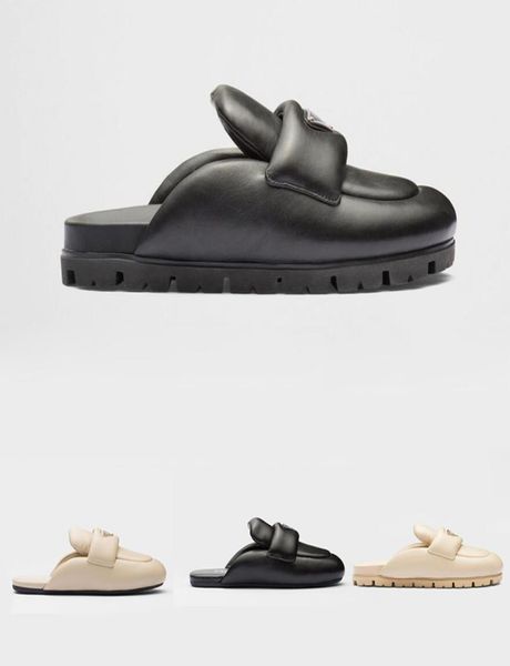 prad soft padded nappa leather sabots sandals desert beige black rubber sole slippers and mules for women7465012
prad soft padded nappa leather sabots sandals desert beige black rubber sole slippers and mules for women7465012