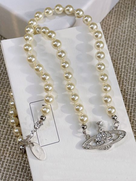 fashion designer vivian pendant necklaces women pearl saturn chokers planet necklace cjeweler woman westwoods jewelry 4854, Silver
fashion designer vivian pendant necklaces women pearl saturn chokers planet necklace cjeweler woman westwoods jewelry 4854, Silver