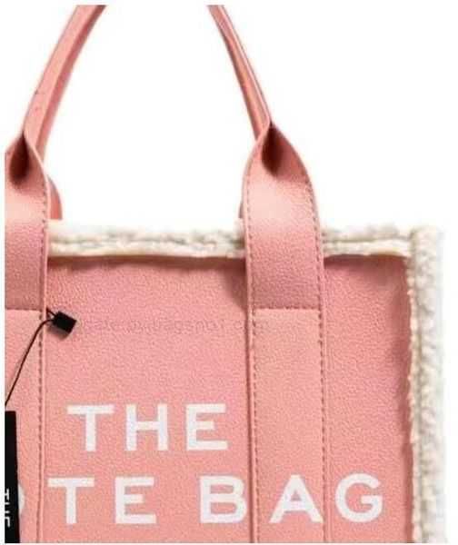 the tote marc pu leather marc fashion handbags with large capacity shoulder for women wallets letter printed tote bag multi colors totes pur
the tote marc pu leather marc fashion handbags with large capacity shoulder for women wallets letter printed tote bag multi colors totes pur