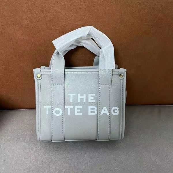the tote marc designer new bag mini medium large size leather embossing shoulder bag handbags high capacity composite bags lnnsjocobs
the tote marc designer new bag mini medium large size leather embossing shoulder bag handbags high capacity composite bags lnnsjocobs