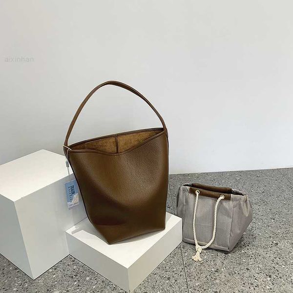 the row small ins premium high capacity commuting tote one shoulder bucket bag