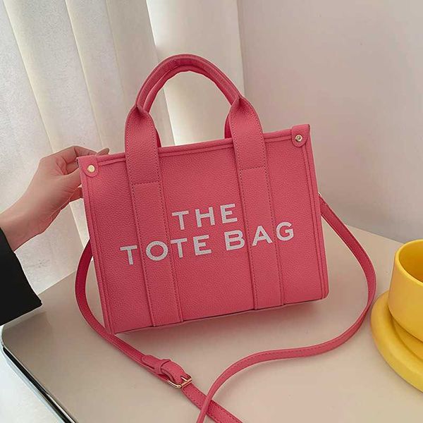 the tote marc new women's fashion letter handbag large capacity one shoulder oblique straddle tote bag jacobswmkrjocobs
the tote marc new women's fashion letter handbag large capacity one shoulder oblique straddle tote bag jacobswmkrjocobs