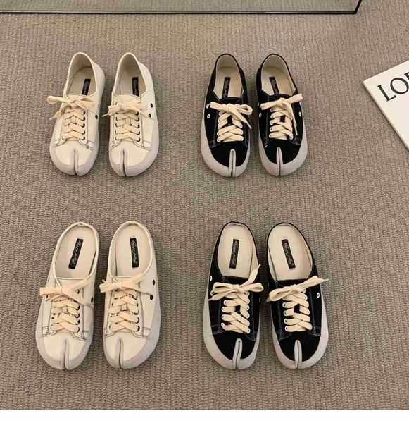 2021 autumn korean version new network red split toe pig shoes women's flat bottom versatile sheep feet casual lace up canvas shoe tren
2021 autumn korean version new network red split toe pig shoes women's flat bottom versatile sheep feet casual lace up canvas shoe tren