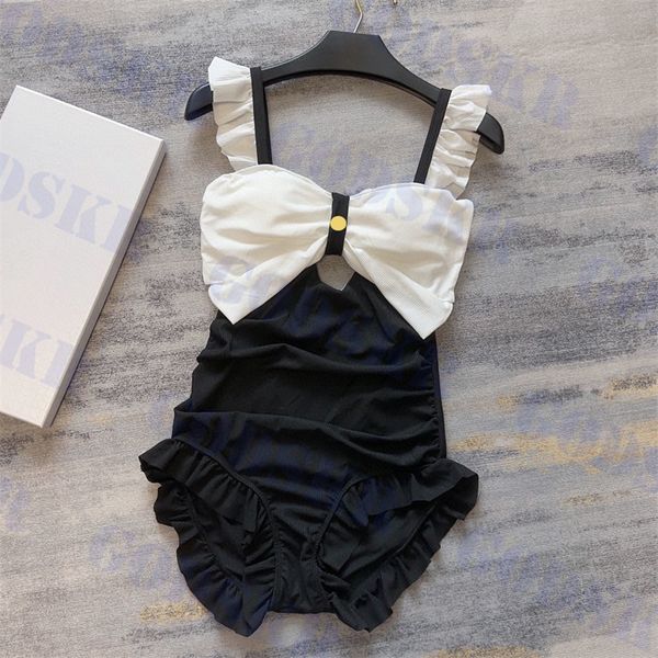 brand womens swimsuit bow design bikini hollow swimwear sling one piece swimsuits two colors, White;black
brand womens swimsuit bow design bikini hollow swimwear sling one piece swimsuits two colors, White;black