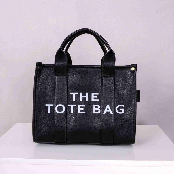 the tote marc new women's large capacity simplified letter handbag versatile commuter tote bag jacobsws1fjocobs
the tote marc new women's large capacity simplified letter handbag versatile commuter tote bag jacobsws1fjocobs