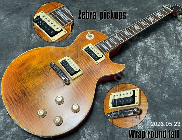 stocking electric guitar can ship out at once orange flame grain relic aged parts warp round bridge and bone nut rosewood
stocking electric guitar can ship out at once orange flame grain relic aged parts warp round bridge and bone nut rosewood