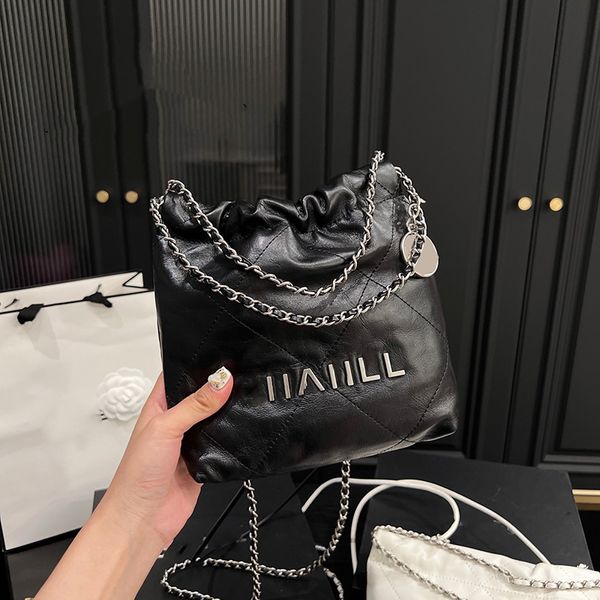 womens classic mini 22 shopping bags black white with coin charm genuine letaher round strap silver metal hardware crossbody shoulder design
womens classic mini 22 shopping bags black white with coin charm genuine letaher round strap silver metal hardware crossbody shoulder design