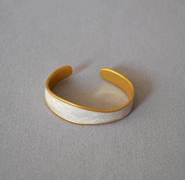 bangle japan korea retro gold and white pearl enamel opening adjustable personality irregular cuff bracelet for women summer jewelry, Black
bangle japan korea retro gold and white pearl enamel opening adjustable personality irregular cuff bracelet for women summer jewelry, Black