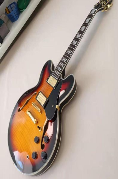 memphis 335 semi hollow sunset jazz electric guitar flame maple veneer side and back shell inlay custom binding9863262
memphis 335 semi hollow sunset jazz electric guitar flame maple veneer side and back shell inlay custom binding9863262
