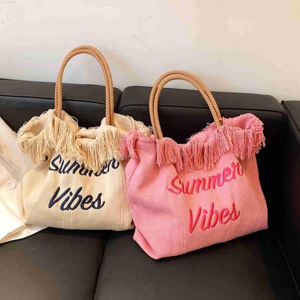 2023 new summer trendy large capacity travel beach shoulder bag for ladies embroidery letters canvas tassel tote handbags
2023 new summer trendy large capacity travel beach shoulder bag for ladies embroidery letters canvas tassel tote handbags