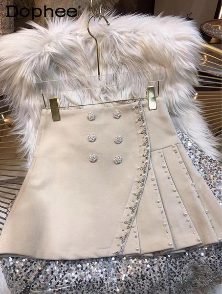 capris korean fashion heavy industry beads pleated skirt women high waist a line short skirt female 2022 spring autumn new mini faldas, Black;white
capris korean fashion heavy industry beads pleated skirt women high waist a line short skirt female 2022 spring autumn new mini faldas, Black;white
