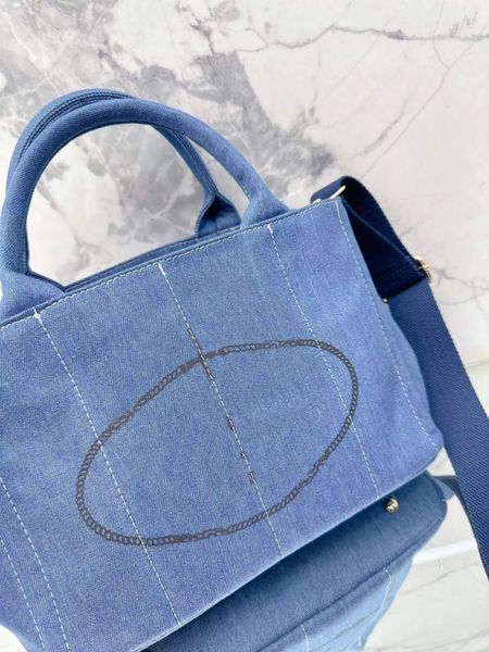 wholesale p luxury designer brands shopping bags women triangle label waterproof leisure travel bag large capacity denim tote bag mommy ladi, Black;red
wholesale p luxury designer brands shopping bags women triangle label waterproof leisure travel bag large capacity denim tote bag mommy ladi, Black;red
