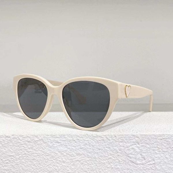 

Fashion designer brand cool sunglasses luxury Super high quality online celebrity the same cat's eye art ins women's versatile plain face glasses 5477 with logo box