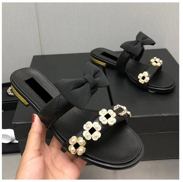 womens low heels slippers designer with bowknot sandals quilted texture slip on slides faux pearl mules ladies retro black peach pink mules
womens low heels slippers designer with bowknot sandals quilted texture slip on slides faux pearl mules ladies retro black peach pink mules