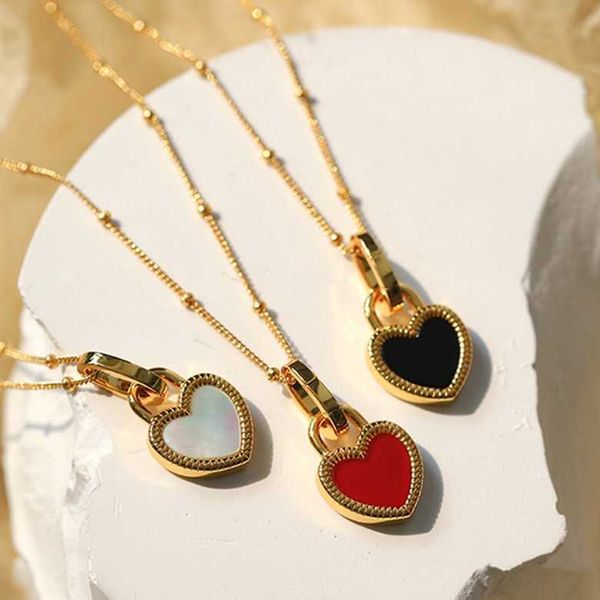 sterling silver love lock necklace with black red agate and white fritillaria double sided wear temperament neckchain
sterling silver love lock necklace with black red agate and white fritillaria double sided wear temperament neckchain