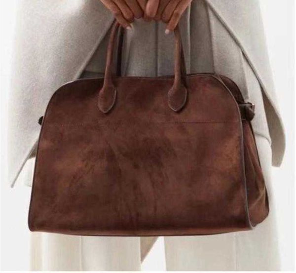 the row margaux 15 handbag high capacity bag cowhide tote travel bowling handbag purse
the row margaux 15 handbag high capacity bag cowhide tote travel bowling handbag purse