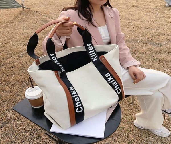 woman canvas bag fashionable casual large capacity tote student singleshoulder bag6749279
woman canvas bag fashionable casual large capacity tote student singleshoulder bag6749279