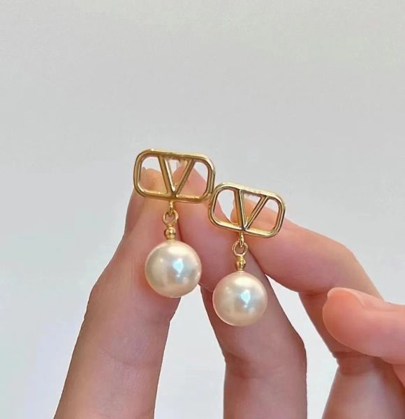 women fashion designer stud earrings white pearl simple style brass engagement earring, Golden;silver
women fashion designer stud earrings white pearl simple style brass engagement earring, Golden;silver