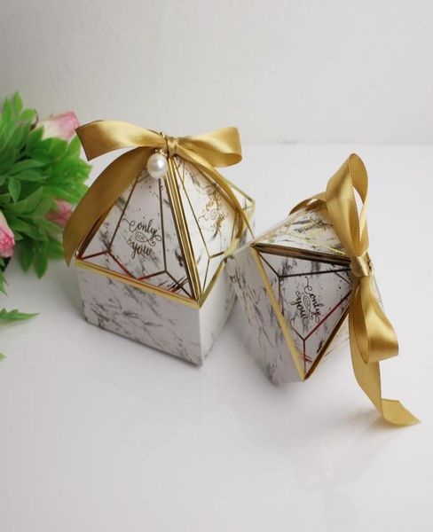 2022 wedding favor holders pagoda type diamond paper candy boxes with ribbon and pearl luxury return gift boxparty supplies4888238
2022 wedding favor holders pagoda type diamond paper candy boxes with ribbon and pearl luxury return gift boxparty supplies4888238