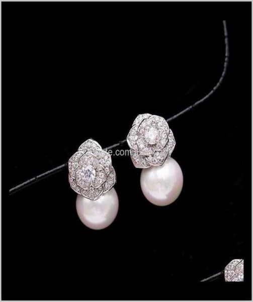 lovely diamond zircon camillia flower pearl earrings for woman girls super glittering ins fashion luxury designer 925 silver post 1911646, Golden;silver
lovely diamond zircon camillia flower pearl earrings for woman girls super glittering ins fashion luxury designer 925 silver post 1911646, Golden;silver