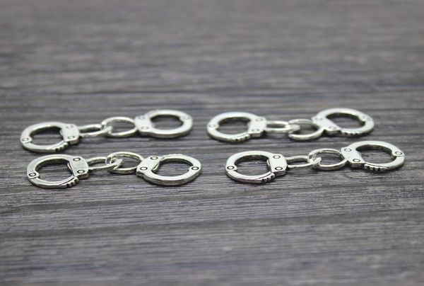 30pcslot 31x11mm antique silver handcuff charm pendant0127222811, Bronze;silver
30pcslot 31x11mm antique silver handcuff charm pendant0127222811, Bronze;silver
