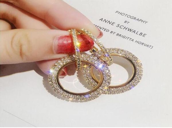 new design creative jewelry highgrade elegant crystal earrings round gold and silver earrings wedding party earrings for woman gb6469385
new design creative jewelry highgrade elegant crystal earrings round gold and silver earrings wedding party earrings for woman gb6469385