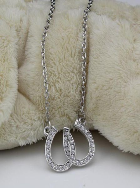 lead and nickel jewellery double horse shoe pendant necklace equestrian horseshoe jewelry decorated with white czech crystal8127102, Silver
lead and nickel jewellery double horse shoe pendant necklace equestrian horseshoe jewelry decorated with white czech crystal8127102, Silver