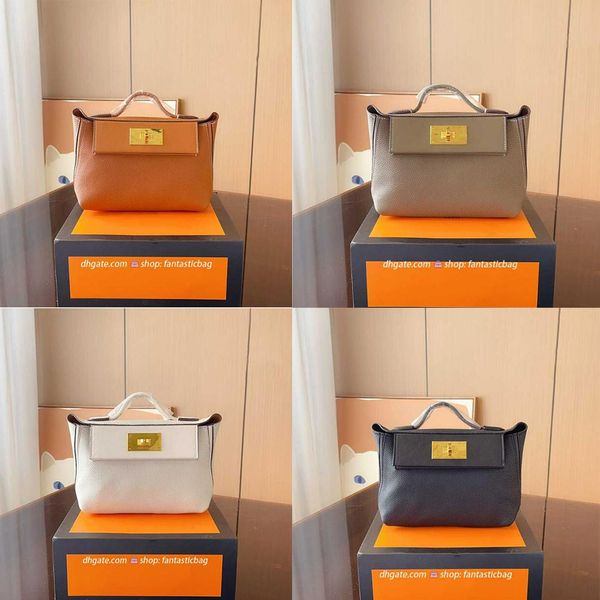 203 designer bag 2424 totes cowhid bags handbag purse shoulder straps and locks have logos
203 designer bag 2424 totes cowhid bags handbag purse shoulder straps and locks have logos