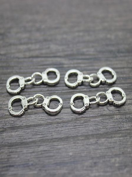 30pcslot 31x11mm antique silver handcuff charm pendant0125749553, Bronze;silver
30pcslot 31x11mm antique silver handcuff charm pendant0125749553, Bronze;silver
