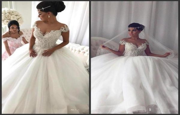 luxury beaded ball gown wedding dresses short cap sleeves lace applique sheer neck illusion floor length wedding gowns vestido de 3822344, White
luxury beaded ball gown wedding dresses short cap sleeves lace applique sheer neck illusion floor length wedding gowns vestido de 3822344, White