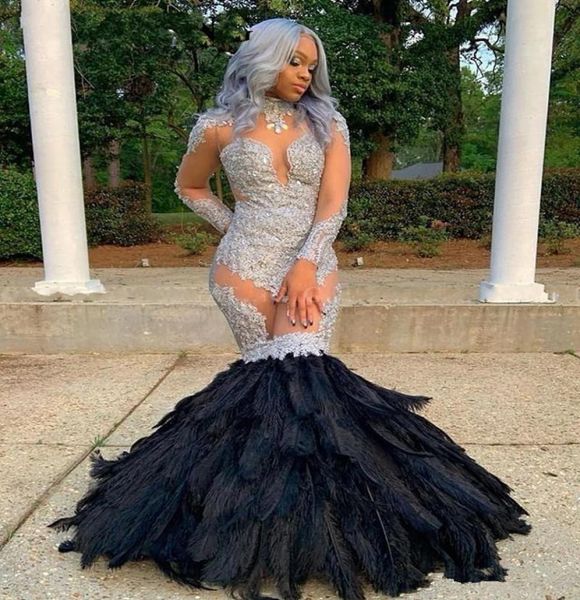 see through mermaid prom dresses with black feathers african lace long sleeves graduation gowns formal party dress7786975
see through mermaid prom dresses with black feathers african lace long sleeves graduation gowns formal party dress7786975