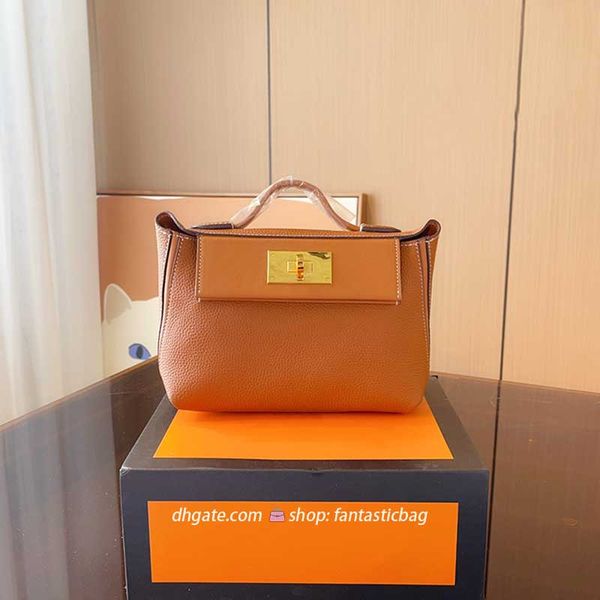 designer bag 2424 totes cowhid bags handbag purse shoulder straps and locks have logos
designer bag 2424 totes cowhid bags handbag purse shoulder straps and locks have logos