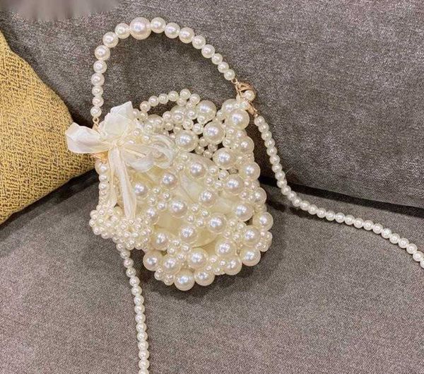 trend evening bags versatile hollow out pearl handbags for woman 2023 new fashion protable purse party shoulder crossbody female purse 23052
trend evening bags versatile hollow out pearl handbags for woman 2023 new fashion protable purse party shoulder crossbody female purse 23052