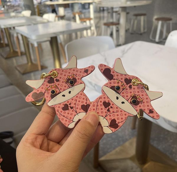 fashion whole presbyopic bull devil bag ornaments car hanging pink and tender calf car key chain pendant cute year of the ox k2860827, Silver
fashion whole presbyopic bull devil bag ornaments car hanging pink and tender calf car key chain pendant cute year of the ox k2860827, Silver