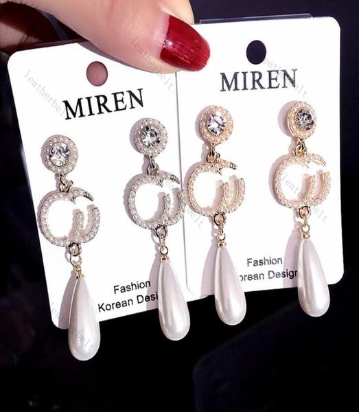 elegant pearl ear pendants luxury letter earring charm stainless steel earrings women wedding party jewelry98797474965467, Golden
elegant pearl ear pendants luxury letter earring charm stainless steel earrings women wedding party jewelry98797474965467, Golden